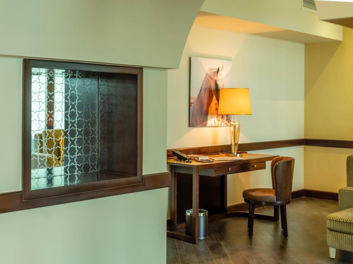 Retaj Salwa Resort & Spa Doha Luaran gambar A room at the Inn at the Opera