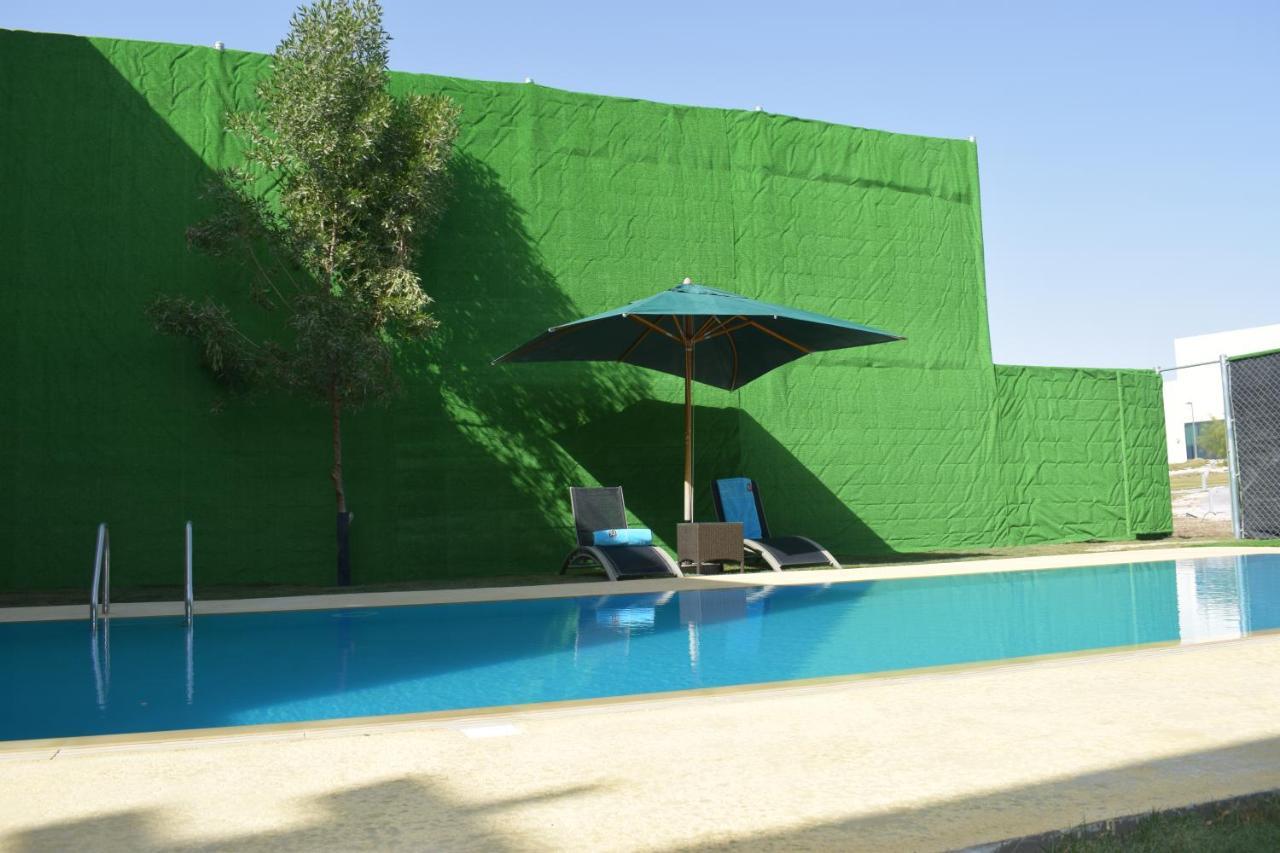 Retaj Salwa Resort & Spa Doha Luaran gambar A swimming pool in Spain
