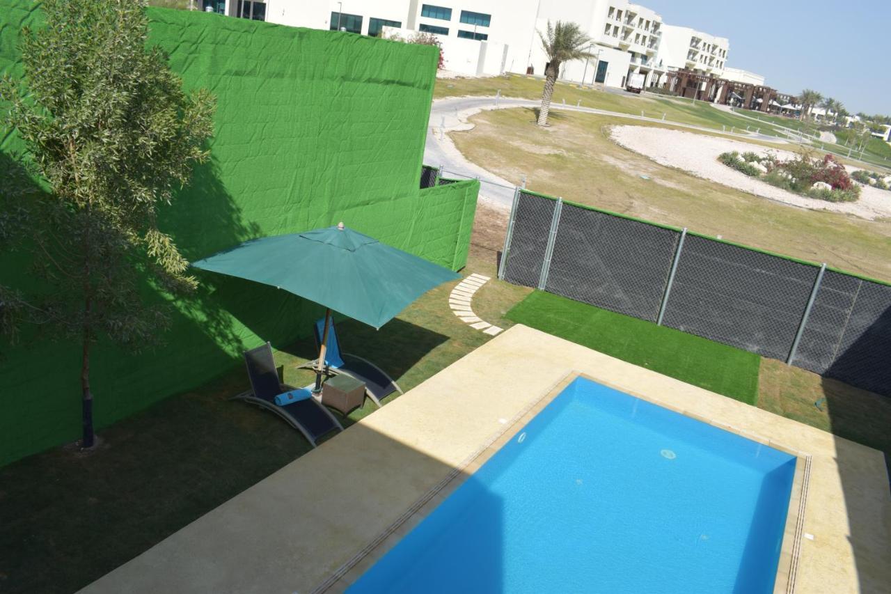 Retaj Salwa Resort & Spa Doha Luaran gambar Swimming pool at the University of Batna